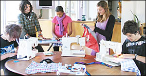 Hard at work at "sociable guerrilla bagging" in Bangalow are (left to right) Tom Lockhart, Zoey Hopkins, Mahalia Taal, Erin Wes Hard at work at "sociable guerrilla bagging" in Bangalow are (left to right) Tom Lockhart, Zoey Hopkins, Mahalia Taal, Erin Wes