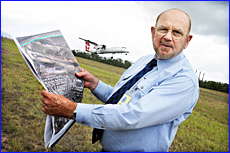 Gladstone Regional Mayor George Creed goes over the airport plans. Gladstone Regional Mayor George Creed goes over the airport plans.