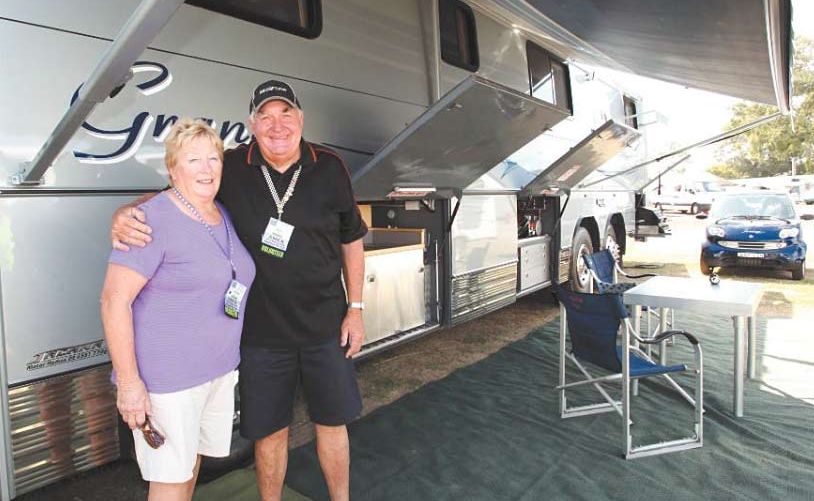 Aileen and Ron Penfold with their luxury motorhome away from home. Aileen and Ron Penfold with their luxury motorhome away from home.