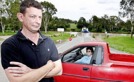 Paul Morton and his mum Dawn had no hope of using the Moggill Ferry yesterday morning. Paul Morton and his mum Dawn had no hope of using the Moggill Ferry yesterday morning.