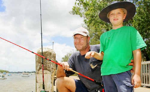 Young angler Daniel Cure, 6, gets a hand from Keith Reynolds to bait his hook and learn the rules of fishing at the Quay Street public wharf in Rockhampton. Daniel caught his first fish, a sooty grunter, which wasn’t big enough to keep but was enough to keep Daniel interested in fishing a bit longer. Young angler Daniel Cure, 6, gets a hand from Keith Reynolds to bait his hook and learn the rules of fishing at the Quay Street public wharf in Rockhampton. Daniel caught his first fish, a sooty grunter, which wasn’t big enough to keep but was enough to keep Daniel interested in fishing a bit longer.