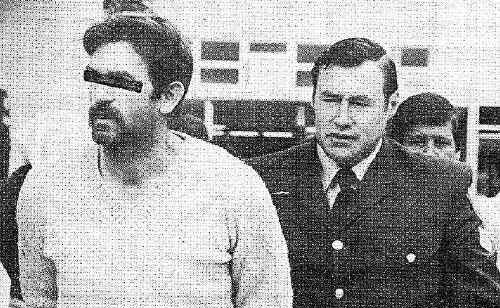 Robin Reid being led into Murwillumbah Court by Sergeant Kevin Welsh on Wednesday, August 11, 1982. Robin Reid being led into Murwillumbah Court by Sergeant Kevin Welsh on Wednesday, August 11, 1982.