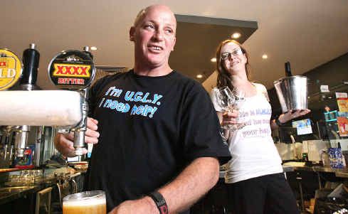 Caledonian Hotel manager Peter Martin lets patrons know he is UGLY with the support of Caroline Court to raise money for charity. Caledonian Hotel manager Peter Martin lets patrons know he is UGLY with the support of Caroline Court to raise money for charity.