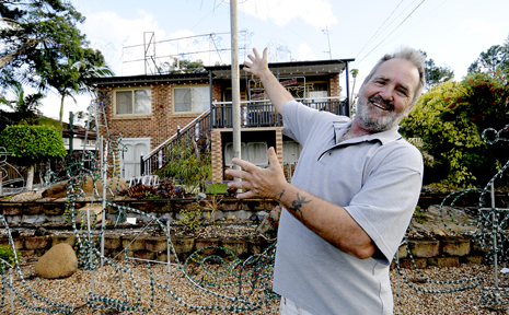 LIGHTS ON: Work has already started on Ray Moore's Kingston home. Photo: Ruth Keber LIGHTS ON: Work has already started on Ray Moore's Kingston home. Photo: Ruth Keber
