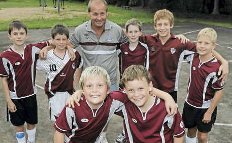 Futsal stars (front) Ty Appleton and Connor Morrison, (back) Mitchell Laughlin, Chase Connelly, coach Troy Appleton, Joshua Adcock, Nicholas Chippendale and Evan Caville. Futsal stars (front) Ty Appleton and Connor Morrison, (back) Mitchell Laughlin, Chase Connelly, coach Troy Appleton, Joshua Adcock, Nicholas Chippendale and Evan Caville.