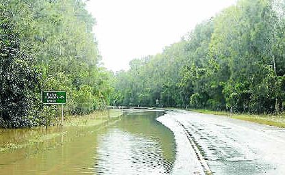 The strip of Pacific Highway just south of the Harwood Bridge under water in recent floods. The strip of Pacific Highway just south of the Harwood Bridge under water in recent floods.