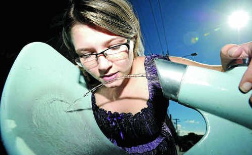 Cassandra Taylor, of Lismore, drinks from one of the water bubblers in Woodlark Street, Lismore. Cassandra Taylor, of Lismore, drinks from one of the water bubblers in Woodlark Street, Lismore.