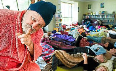 Nap guardian David Pepper keeps the peacefulness going during Australia’s first Nap-in held in Bellingen yesterday. Nap guardian David Pepper keeps the peacefulness going during Australia’s first Nap-in held in Bellingen yesterday.