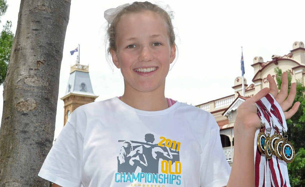 Harriet Hudson with five state medals in rowing. Harriet Hudson with five state medals in rowing.