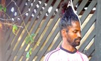 Suthakaran Sivagnanathurai trains to set a Guinness World Record for hanging by his hair. Suthakaran Sivagnanathurai trains to set a Guinness World Record for hanging by his hair.
