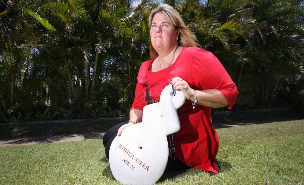 Joanne Ufer with a plaque commemorating her son Josh who died in New Zealand’s Pike River mine disaster. Joanne Ufer with a plaque commemorating her son Josh who died in New Zealand’s Pike River mine disaster.