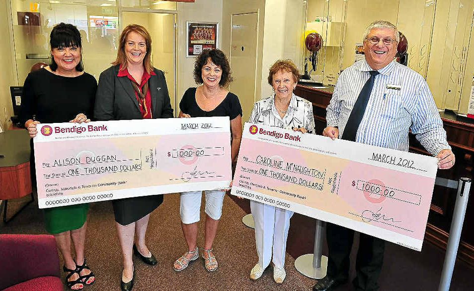 AWinners of the Noosa News promotion "We Love Noosa" competition, Alison Duggan and Caroline McNaughton (centre) are presented with their Bendigo Bank cheques by Noosa News Manager Sue Swann (left), Cooroy Branch Manager Fiona Hutchings and Tewantin Branch Manager Wayne Hoens. AWinners of the Noosa News promotion "We Love Noosa" competition, Alison Duggan and Caroline McNaughton (centre) are presented with their Bendigo Bank cheques by Noosa News Manager Sue Swann (left), Cooroy Branch Manager Fiona Hutchings and Tewantin Branch Manager Wayne Hoens.