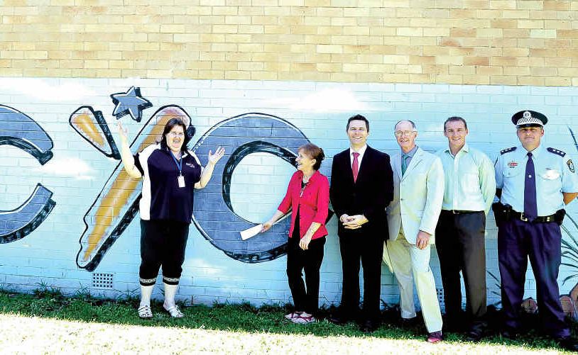 Home Affairs Minister Jason Clare (third from right) with (from left) Lismore PCYC administration officer Sharon Irwin, Page MP Janelle Saffin, Lismore PCYC president John Maxwell, deputy mayor Isaac Smith and Detective Inspector Matt Kehoe. Home Affairs Minister Jason Clare (third from right) with (from left) Lismore PCYC administration officer Sharon Irwin, Page MP Janelle Saffin, Lismore PCYC president John Maxwell, deputy mayor Isaac Smith and Detective Inspector Matt Kehoe.