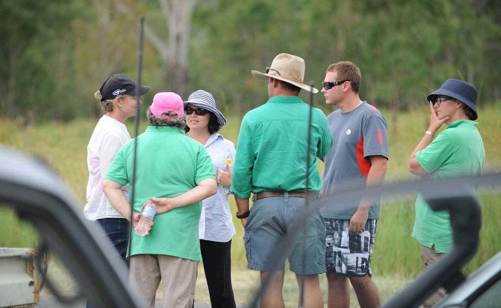 Family of the missing motorcyclist gather at the forward command post along the Gin Gin Mount Perry road. Family of the missing motorcyclist gather at the forward command post along the Gin Gin Mount Perry road.