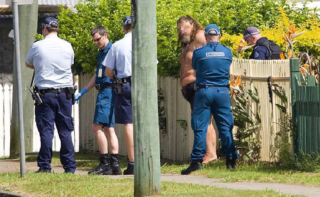 LOCKDOWN: Suburb in siege at Norman St in Basin Pocket on Friday morning. Photo: Rob Williams LOCKDOWN: Suburb in siege at Norman St in Basin Pocket on Friday morning. Photo: Rob Williams