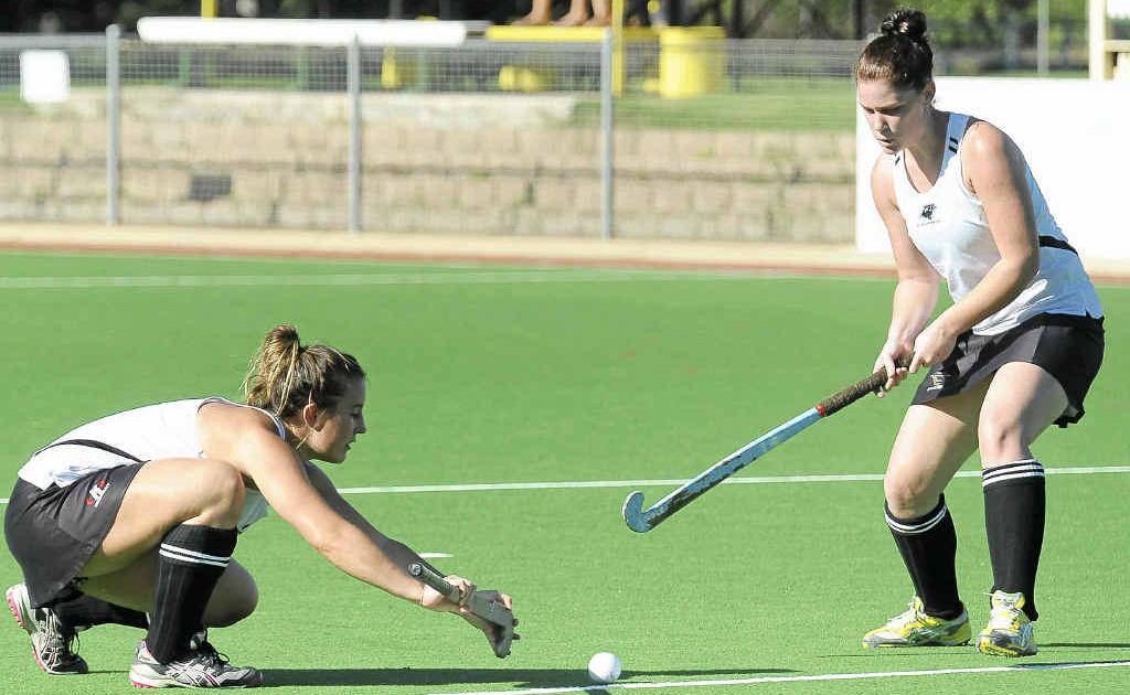 Caitlin Clark and Stacey Neller during a short corner against the Granville Rovers. Caitlin Clark and Stacey Neller during a short corner against the Granville Rovers.