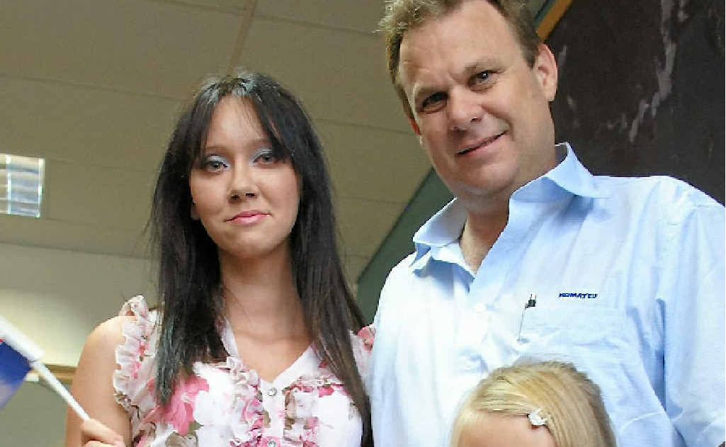Kate Duffy, with her family, was granted Australian citizenship at Friday’s ceremony. Kate Duffy, with her family, was granted Australian citizenship at Friday’s ceremony.