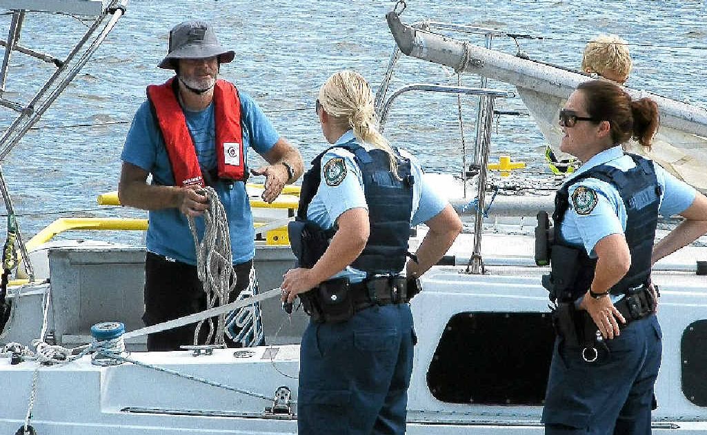 Yacht skipper Ken Hogan speaks to police after a tow to the Lance Ferris Wharf. Yacht skipper Ken Hogan speaks to police after a tow to the Lance Ferris Wharf.
