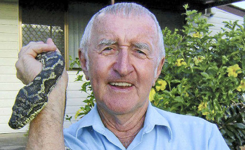 Clarence Valley snake and reptile handler Paul Jones with his pet python, Jacqueline. Clarence Valley snake and reptile handler Paul Jones with his pet python, Jacqueline.