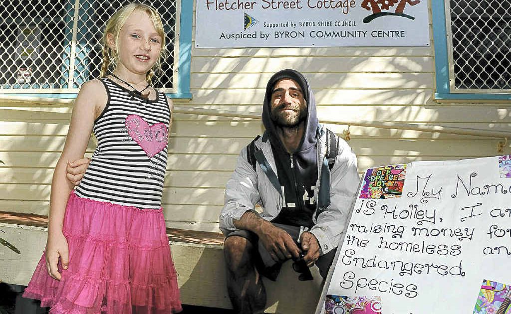 BIG HEART: Holley Somerville and Bear at the Fletcher St Cottage, for which she raised more than $100. BIG HEART: Holley Somerville and Bear at the Fletcher St Cottage, for which she raised more than $100.