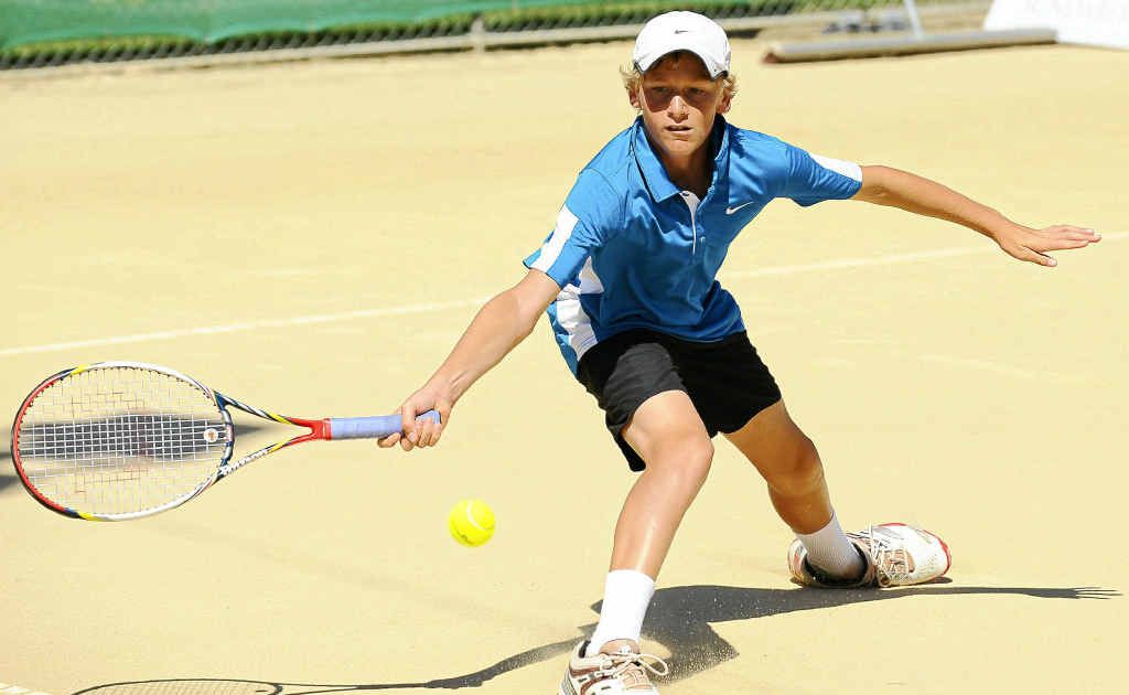 Max Purcell competes in the Queensland Junior Claycourt International at Drinan Park yesterday. Max Purcell competes in the Queensland Junior Claycourt International at Drinan Park yesterday.