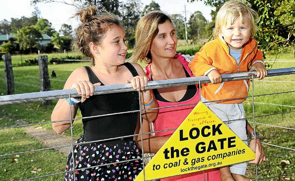Lilly, Jess, and Norman Coleman, of Tucabia, with their anti-CSG Lock the Gate sign. Lilly, Jess, and Norman Coleman, of Tucabia, with their anti-CSG Lock the Gate sign.