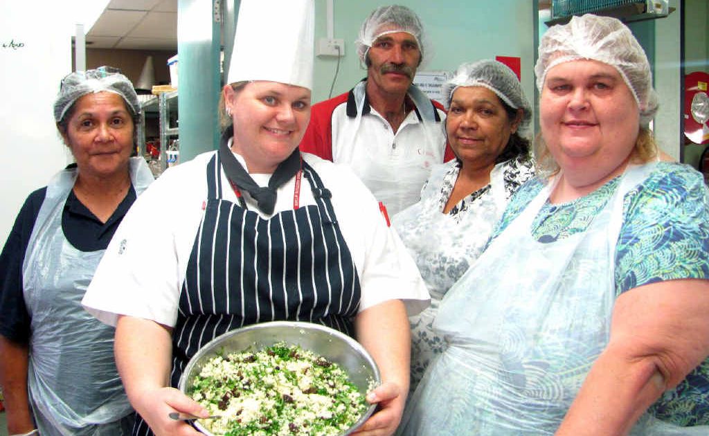 EATING WELL: Cook for Life trainee Meryleen Renouf with TAFE chef Carmen Crain and classmates Lindsay Bayles, Patsy Klass and Linda McDonald. EATING WELL: Cook for Life trainee Meryleen Renouf with TAFE chef Carmen Crain and classmates Lindsay Bayles, Patsy Klass and Linda McDonald.