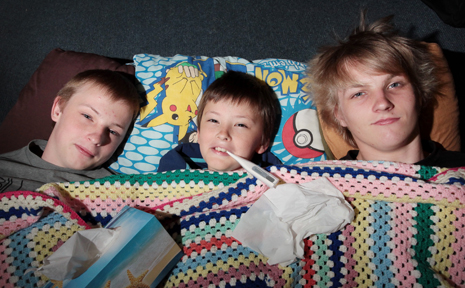 David Tutton, 14, Robert Tutton, 9, and Raymond Tutton, 15, are getting prepared for flu season. David Tutton, 14, Robert Tutton, 9, and Raymond Tutton, 15, are getting prepared for flu season.