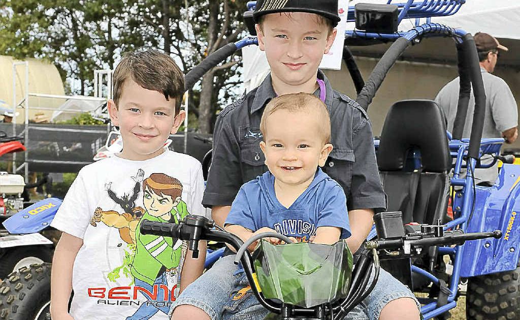 James, Riley and Nate Harney of Childers try out a Grudge Quad Bike at Agro Trend. James, Riley and Nate Harney of Childers try out a Grudge Quad Bike at Agro Trend.