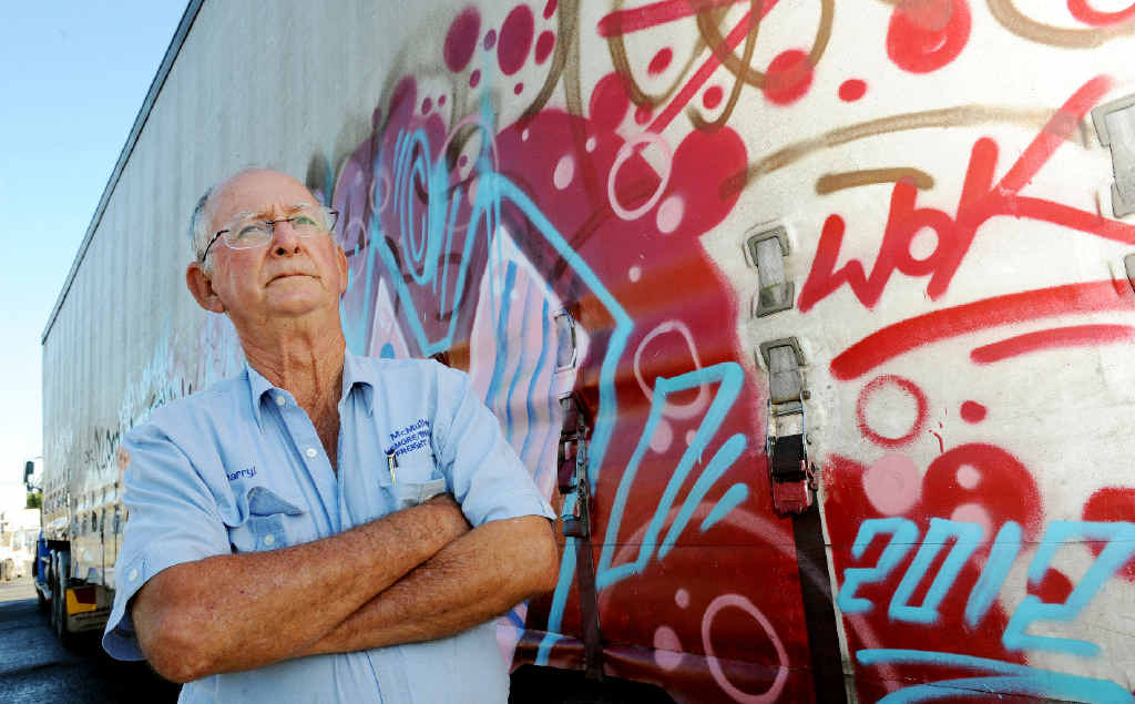 Darryl McMullen, operations co-ordinator with McMullen Freight Lines in front of the vandalised curtain sides on his semi trailer. Darryl McMullen, operations co-ordinator with McMullen Freight Lines in front of the vandalised curtain sides on his semi trailer.