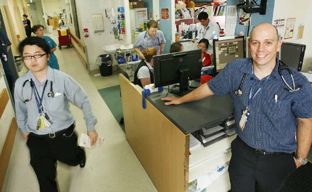 Emergency Department executive director Dr Dan Bitmead (right) in the busy Ipswich Hospital Emergency Department. Emergency Department executive director Dr Dan Bitmead (right) in the busy Ipswich Hospital Emergency Department.