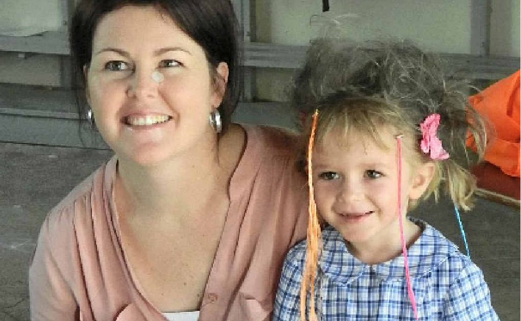 Teacher Nikki Malone with the prize winner for her crazy hair-do, Madison Harland. Teacher Nikki Malone with the prize winner for her crazy hair-do, Madison Harland.