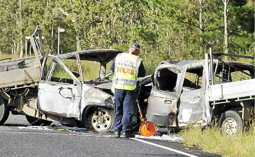 Police inspect the scene of the double fatality on the Summerland Way near the intersection with Leeville Station Rd. Police inspect the scene of the double fatality on the Summerland Way near the intersection with Leeville Station Rd.