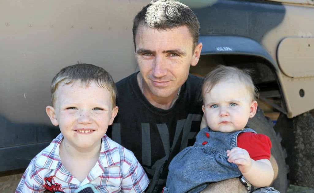 Cade (4) and Laylah (10 months) are glad to have their dad, Gavin McMillan, back after he spent seven months away on deployment with the Army Reserves. Cade (4) and Laylah (10 months) are glad to have their dad, Gavin McMillan, back after he spent seven months away on deployment with the Army Reserves.