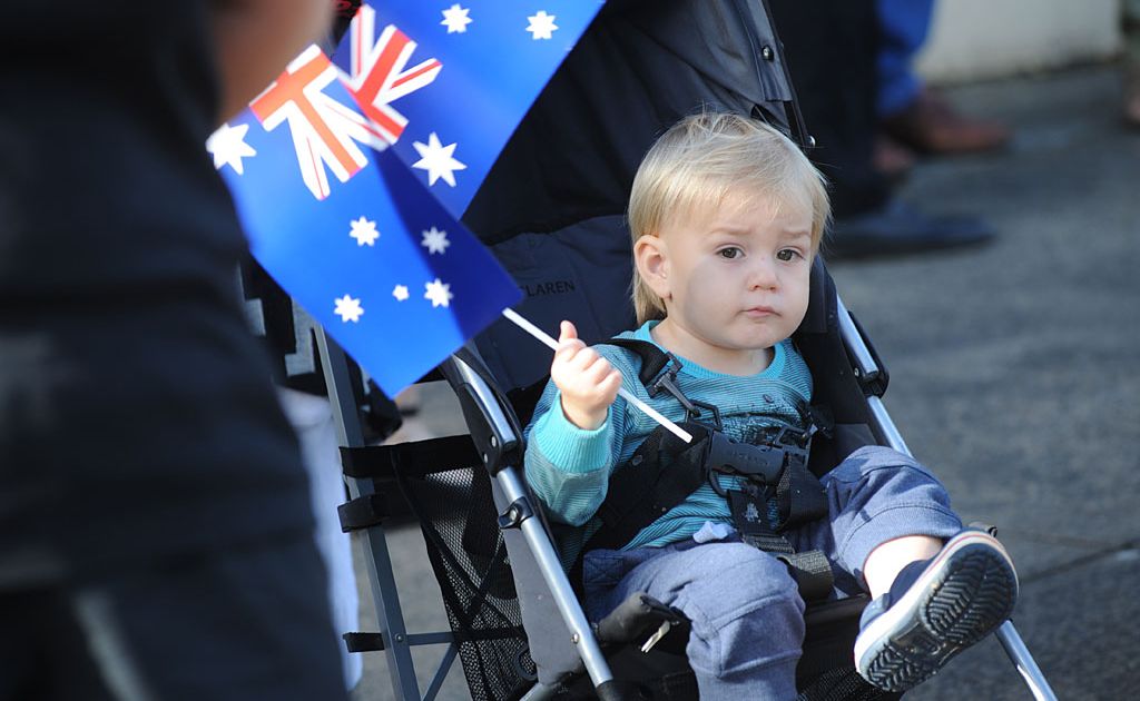 A toddler looks on during Lismore's annual Anzac Parade. A toddler looks on during Lismore's annual Anzac Parade.