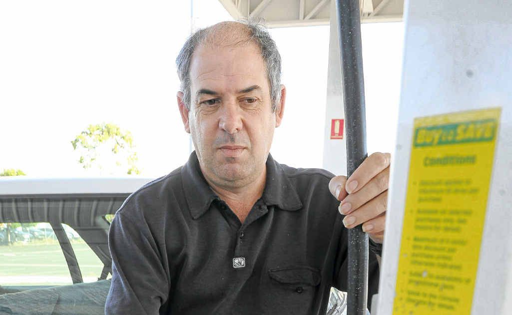 lan Baxter fills up the tank at the Sugarland Matilda. Bundaberg fuel prices are higher than further south in Brisbane. lan Baxter fills up the tank at the Sugarland Matilda. Bundaberg fuel prices are higher than further south in Brisbane.