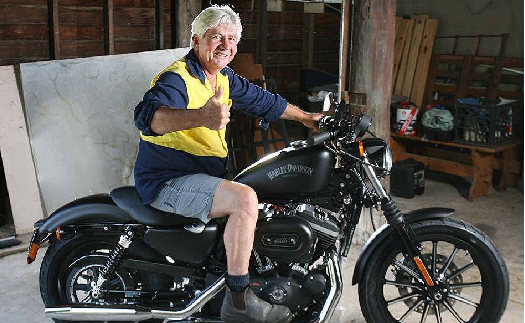 Ipswich resident Wayne Kelly is the proud owner of a Harley-Davidson motorcycle he won playing Keno. Ipswich resident Wayne Kelly is the proud owner of a Harley-Davidson motorcycle he won playing Keno.