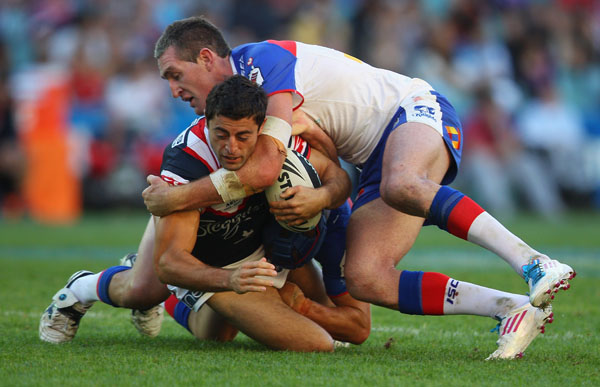 Anthony Minichiello of the Roosters is tackled during the round nine NRL match between the Sydney Roosters and the Newcastle Knights at Allianz Stadium Anthony Minichiello of the Roosters is tackled during the round nine NRL match between the Sydney Roosters and the Newcastle Knights at Allianz Stadium
