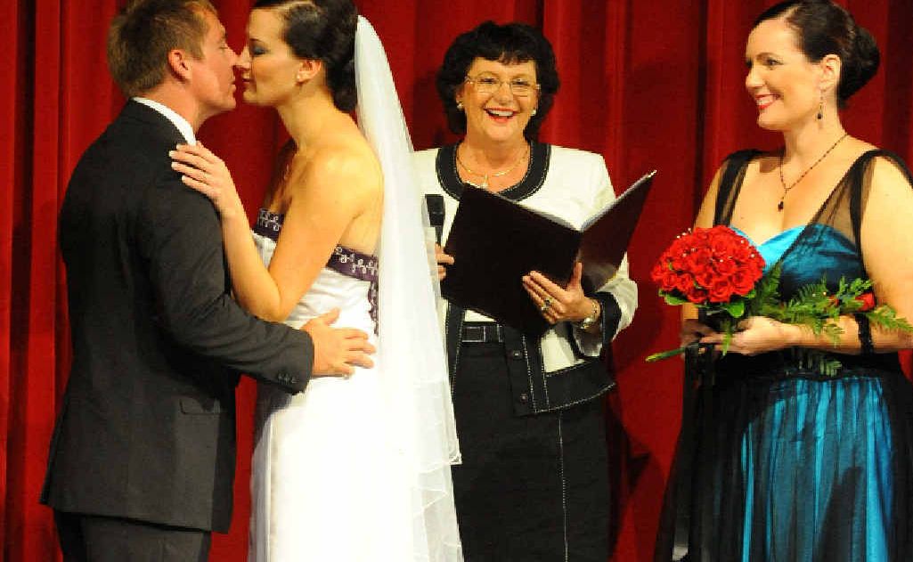 Groom Geoffrey Smith and bride Eloise McLellan kiss during their wedding ceremony at the Moncrieff Theatre. Groom Geoffrey Smith and bride Eloise McLellan kiss during their wedding ceremony at the Moncrieff Theatre.