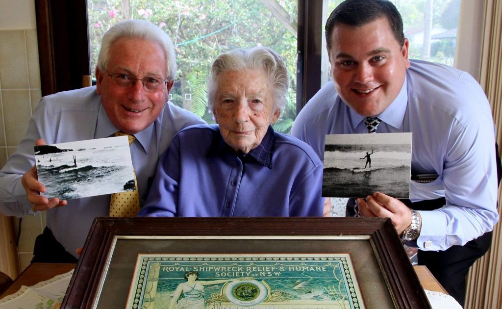 Osric Notley's relatives from the Central Coast (from left) great nephew Dennis West, niece Peggy West and great great nephew Andrew West with the original bravery award Osric Notley received for an ocean rescue on Main Beach Yamba in 1912 the family have donated to the Yamba community. PHOTO: Debrah Novak Osric Notley's relatives from the Central Coast (from left) great nephew Dennis West, niece Peggy West and great great nephew Andrew West with the original bravery award Osric Notley received for an ocean rescue on Main Beach Yamba in 1912 the family have donated to the Yamba community. PHOTO: Debrah Novak
