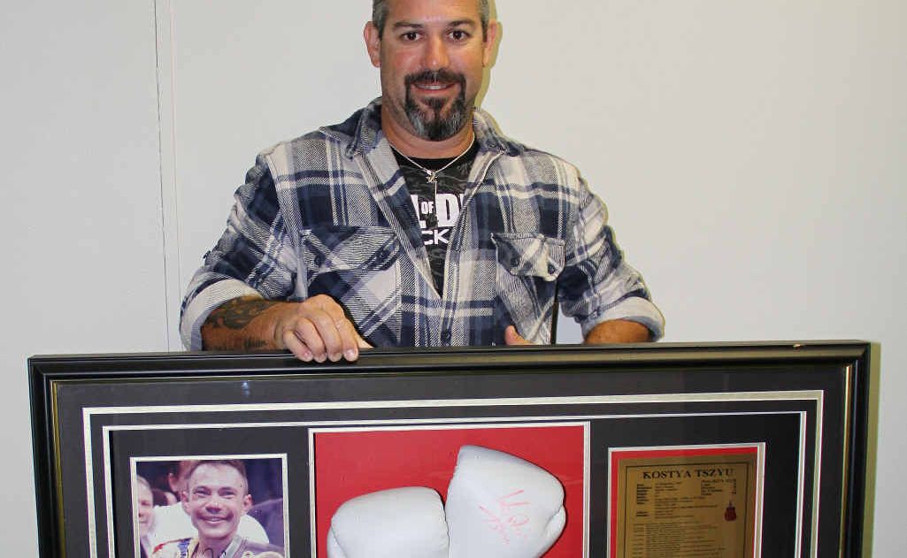 Dave Barnes is selling his brother’s signed Kostya Tzu glove to raise money to help families affected by cancer. Dave Barnes is selling his brother’s signed Kostya Tzu glove to raise money to help families affected by cancer.