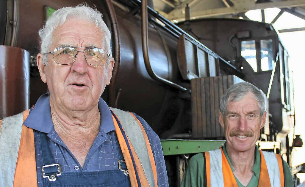Southern Downs Steam Railway president John Brady (left) and volunteer Ed Diery, pictured next to the much-loved C17 loco which runs to Clifton on Sunday. Southern Downs Steam Railway president John Brady (left) and volunteer Ed Diery, pictured next to the much-loved C17 loco which runs to Clifton on Sunday.