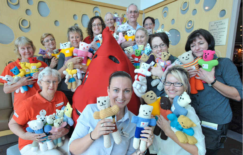 Red Cross Coffs Harbour and Woolgoolga Blood Service and C.ex Group staff proudly show off their Trauma Teddys. Red Cross Coffs Harbour and Woolgoolga Blood Service and C.ex Group staff proudly show off their Trauma Teddys.