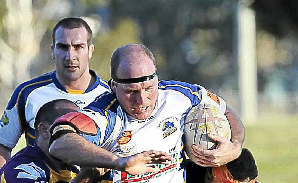 Mustangs’ Lionel Foster attempts bust through two Grafton Rhinos defenders last season. The big prop will be out to post another try or three against Ballina tomorrow. Mustangs’ Lionel Foster attempts bust through two Grafton Rhinos defenders last season. The big prop will be out to post another try or three against Ballina tomorrow.