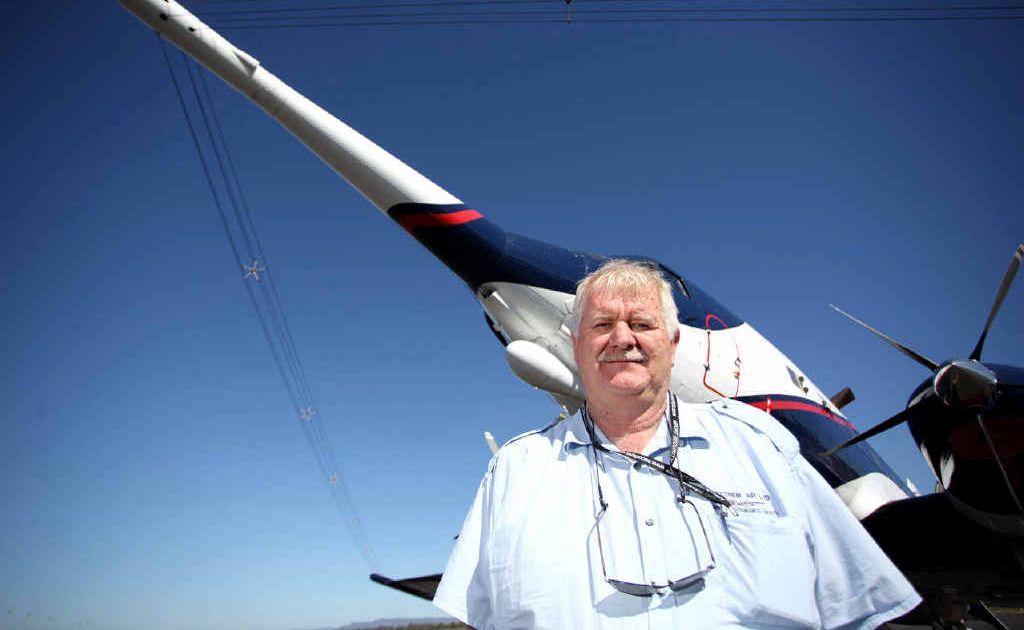 Pilot Charl Yssel stands beneath the nose of his specially adapted Dakota. Pilot Charl Yssel stands beneath the nose of his specially adapted Dakota.