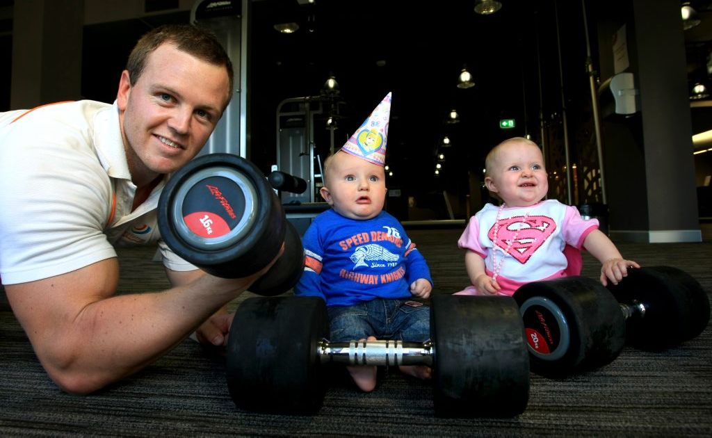Ruby Wright and Jake Cleverley with strong man Tom Kingston. Photo: John Gass / Daily News Ruby Wright and Jake Cleverley with strong man Tom Kingston. Photo: John Gass / Daily News