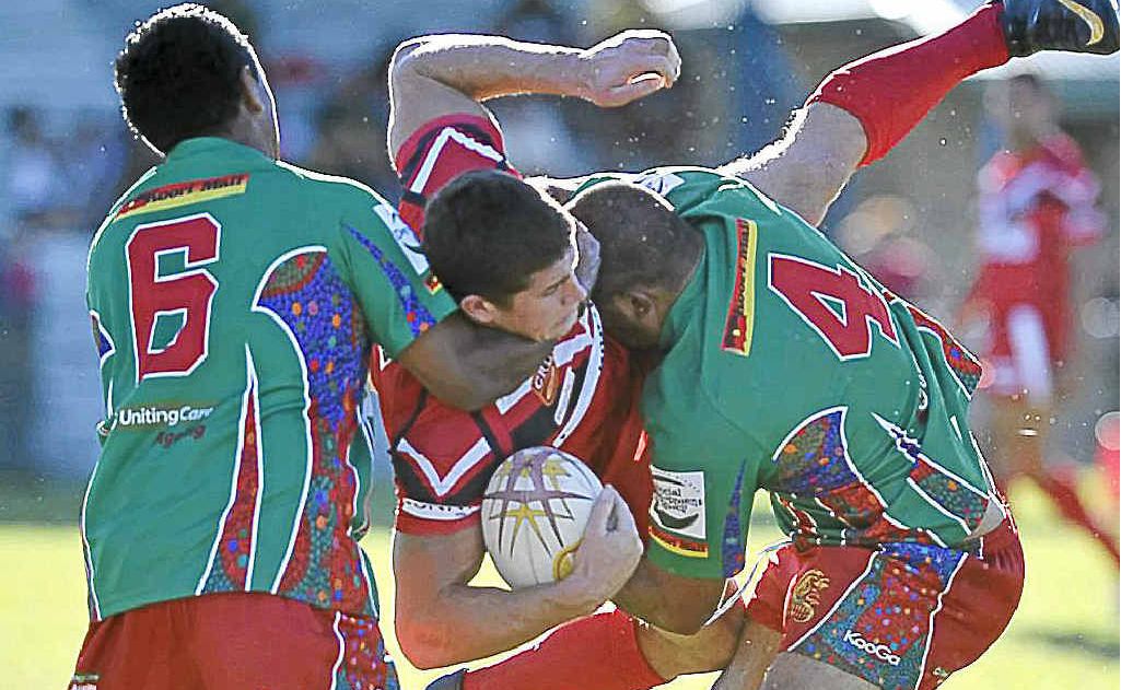 Northern United’s Dan Randall (No.4) stops Cale Rowston of Byron Bay in United’s 26-21 loss at Crozier Field, Lismore. Northern United’s Dan Randall (No.4) stops Cale Rowston of Byron Bay in United’s 26-21 loss at Crozier Field, Lismore.