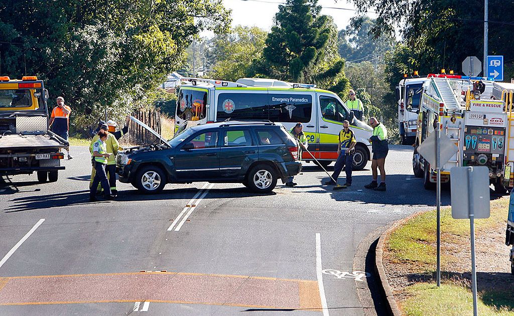 Crews recover a four-wheel drive at the intersection of Pine St and Delacy. Crews recover a four-wheel drive at the intersection of Pine St and Delacy.