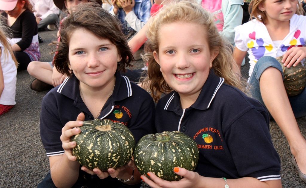 Ashley Knight (left) and Emily Hutton wait with excitement for their chance to roll a pumpkin in the Great Australian Pumpkin Roll.
Ashley Knight (left) and Emily Hutton wait with excitement for their chance to roll a pumpkin in the Great Australian Pumpkin Roll.