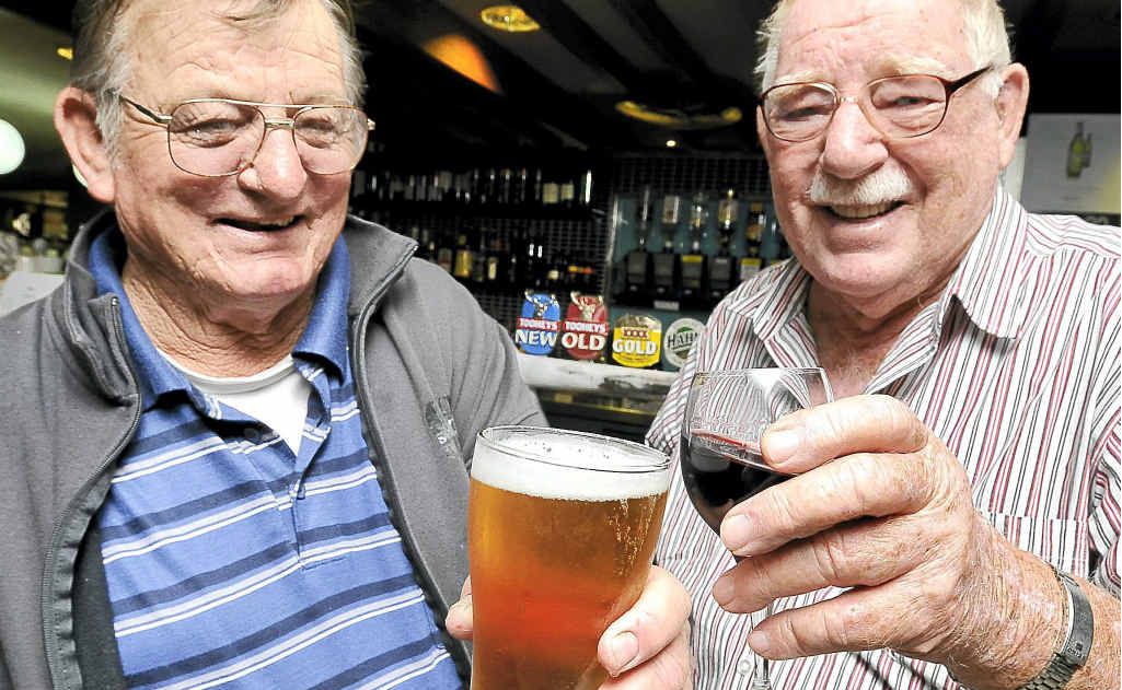 Devout beer drinker Rusty Britt, of Lismore, left, and wine drinker Bill Dempsey, of Tweed Heads, debate the merits of their chosen drops. Devout beer drinker Rusty Britt, of Lismore, left, and wine drinker Bill Dempsey, of Tweed Heads, debate the merits of their chosen drops.